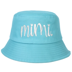 Detailed close-up of white mimi letter embroidery on light blue cotton bucket hat