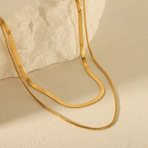 Double-layered gold stainless steel necklace with flat snake chain and thin link chain