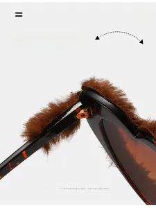 Detailed macro view of durable metal hinges and brown faux fur trim on heart sunglasses