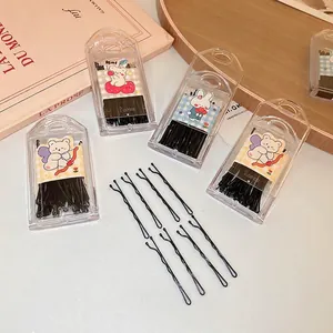Black wavy bobby pins set in a cute cartoon bear storage box for women daily hair styling