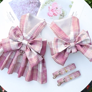 Detail of pink plaid dog harness dress with mesh lining and matching leash set