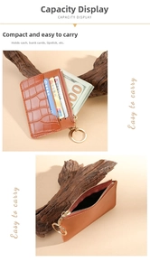 Brown crocodile leather card holder with multiple slots and gold zipper detailing