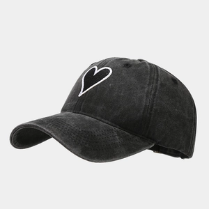 Vintage washed charcoal baseball cap with heart embroidery patch and curved brim