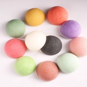 Heart-shaped arrangement of colorful biodegradable konjac facial sponges for deep cleansing