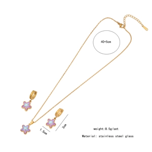 Detailed view of purple star necklace and earrings set with measurements and weights