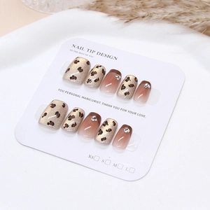Handmade brown French leopard print press-on nails with cat eye shimmer and crystal accents