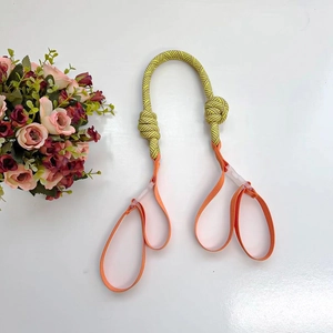 Detail of durable braided nylon dog leash with heavy-duty knots and orange hand loops