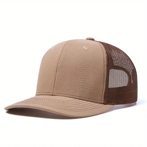 Detail view of khaki and coffee trucker hat showing breathable mesh and curved visor