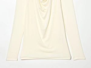 Detailed macro view of cream white ribbed knit fabric and cowl neck design for women