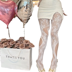 White floral lace tights with intricate hollow out patterns and gothic style mesh texture