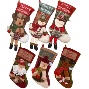 Set of 6 decorative Christmas stockings featuring 3D Santa, Snowman, and Reindeer designs