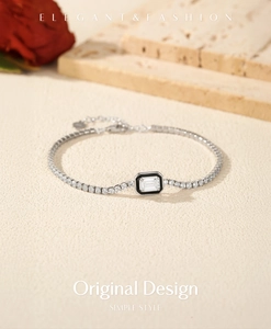 Close-up of S925 sterling silver bracelet with black enamel and brilliant zircon accents