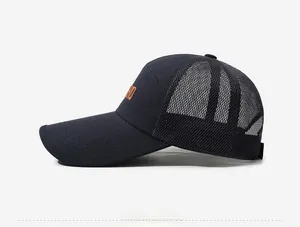 Detail of breathable mesh baseball cap with side embroidery and extended visor brim