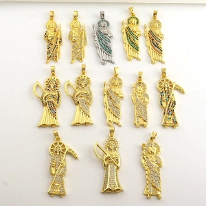 Macro shot of 13 colorful zircon encrusted saint pendants in gold and silver plating