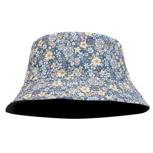 Double-sided floral bucket hat for women with colorful small flower patterns on white
