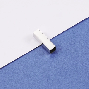 Macro shot of mirror-polished stainless steel hollow rectangular tube charm for DIY bracelets