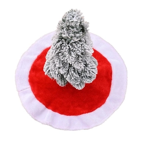 Red plush Christmas tree skirt with white faux fur trim for holiday decoration