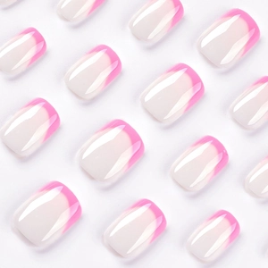 Short square pink gradient French press-on nails set arranged on a white background
