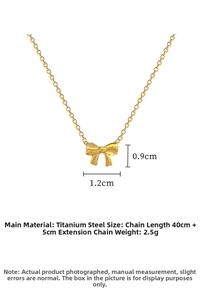 Detail view of gold bow necklace with dimensions 1.2cm x 0.9cm and 45cm total length