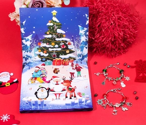 Close-up of a 24-day Christmas advent calendar box with festive DIY charm bracelets