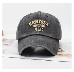 Close-up of vintage washed cotton baseball cap featuring high-quality 3D embroidery detail