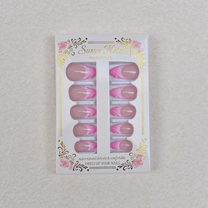 Detailed view of 24pcs pink press-on nails with white flame texture and premium packaging
