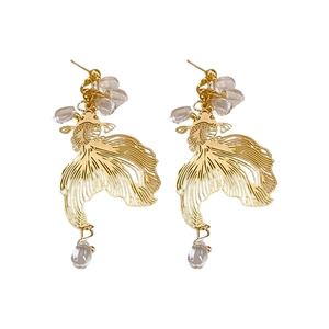 Elegant gold hollow koi fish earrings with crystal teardrop beads on white background