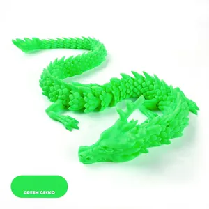 Detailed view of 3D printed articulated dragon toy in fluorescent green gecko finish