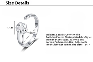 Detailed view of adjustable cat paw open ring with 2.2g weight and polished silver finish