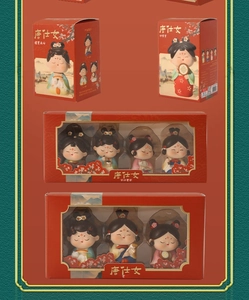 Detailed view of Tang Dynasty lady figurine packaging in traditional red gift boxes