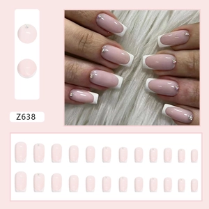 Pink French style medium square press-on nails with white tips and small rhinestone detail