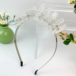 Handmade natural crystal crown headband with rhinestones and pearls on display stand