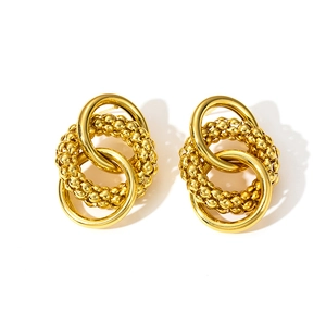 Triple interlocking gold hoops with smooth and textured bead pattern for women