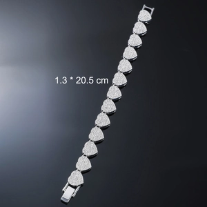 Silver iced-out heart link bracelet with micro-pave crystals and fold-over watch clasp