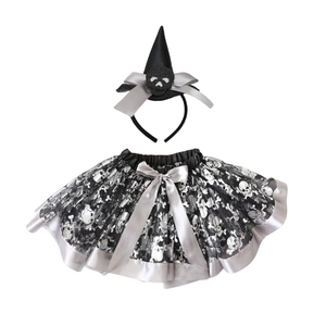 Close-up of Halloween tutu skirt and headband with silver skull and bone pattern details