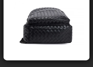 Detailed view of black woven leather texture and side structure of the men's crossbody bag