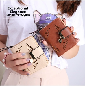 Detail showing beige and brown PU leather purses with hollow leaf patterns and metal pendants