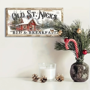 Close-up of Old St. Nick's Christmas wooden sign on wall with pine and candle decor