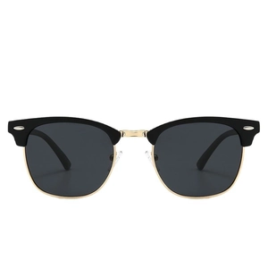 Classic semi-rimless Clubmaster sunglasses with black and gold frame and polarized lenses