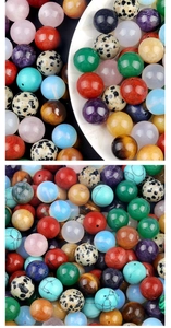 Macro detail of various 12mm semi-drilled natural stone beads for DIY jewelry making