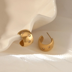 Polished 18K gold plated C-shaped starburst earrings with sparkling zircon stones