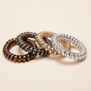 Set of 4 metallic spiral hair ties in gold, silver, bronze and grey colors