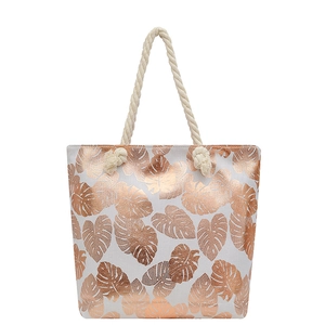 Linen-style tote bag with metallic rose gold monstera leaf pattern and rope handles