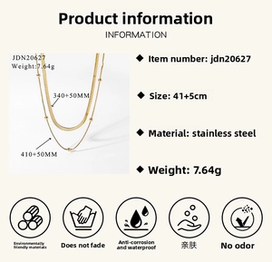 Detailed spec view of gold layered stainless steel snake and bead chain necklace