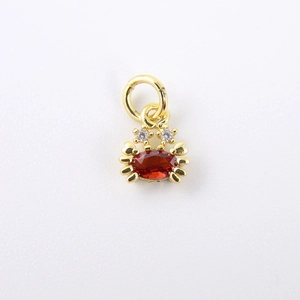 Exquisite gold-plated crab pendant with large red gemstone and zircon accents for jewelry DIY