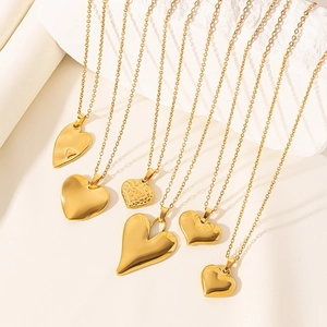 Golden heart necklaces collection with various hollow patterns and matte finishes on stone