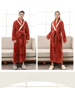 Detail of couple wearing thick flannel robes with waffle texture and contrast collar