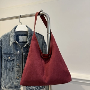 Retro deep red faux suede hobo tote bag with a minimalist triangle design and wide strap