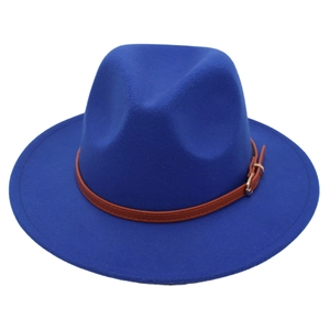 Detail of royal blue wool fedora hat featuring a brown leather band and golden buckle