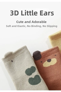 Detailed view of baby grip socks with cute 3D ears and non-slip knitted fabric